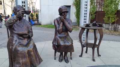 statues of women having tea and discussing suffrage, calgary