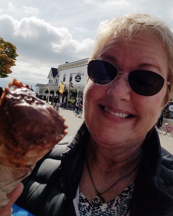 Karin shows off excellent ice cream while visiting Mackinaw City.