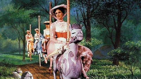 Mary Poppins Julie Andrews on her carousel horse and 1890s white dress