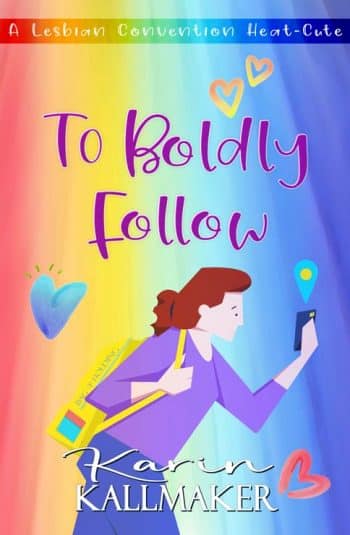 Cover, To Boldly Follow, a lesbian convention heat-cute by Karin Kallmaker. A cartoon redheaded, pink-skinned woman in purple clothes and carrying a yellow Bag of Holding gazes at her phone. Yellow, blue, and pink hearts sprinkle across a rainbow-gradient background. Published by Romance and Chocolate Ink.