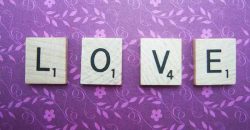 love spelled in scrabble tiles